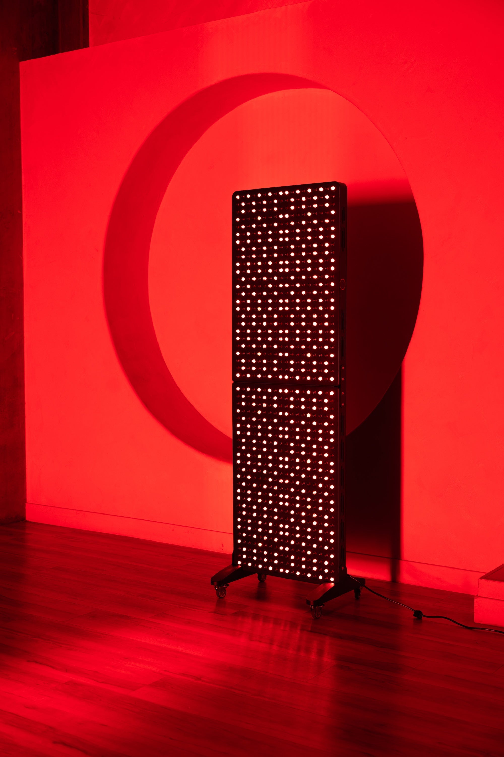 Renew Max red light therapy panel, full front view in a studio setting