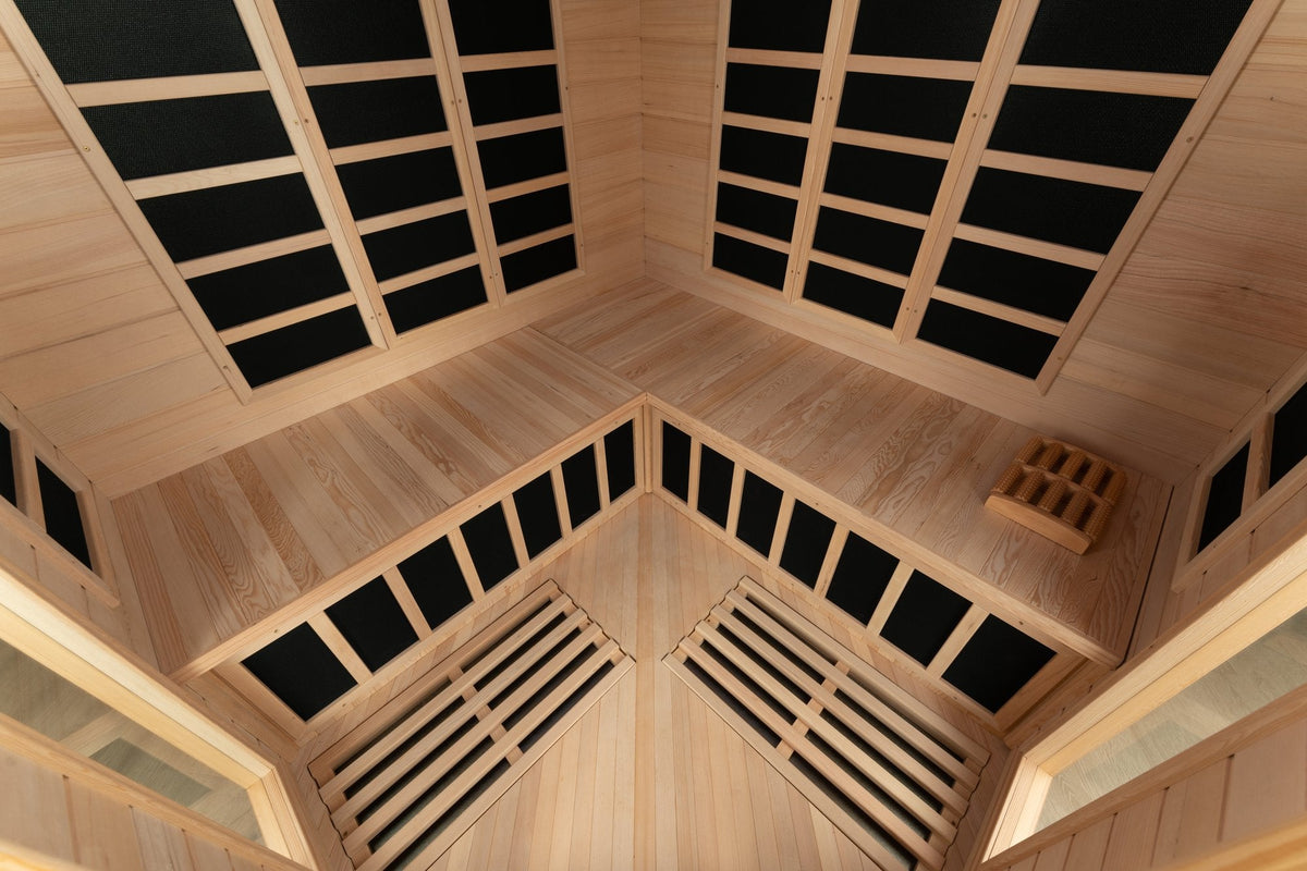 Blisspod Vienna corner sauna, close-up view of interior wooden bench and floor.