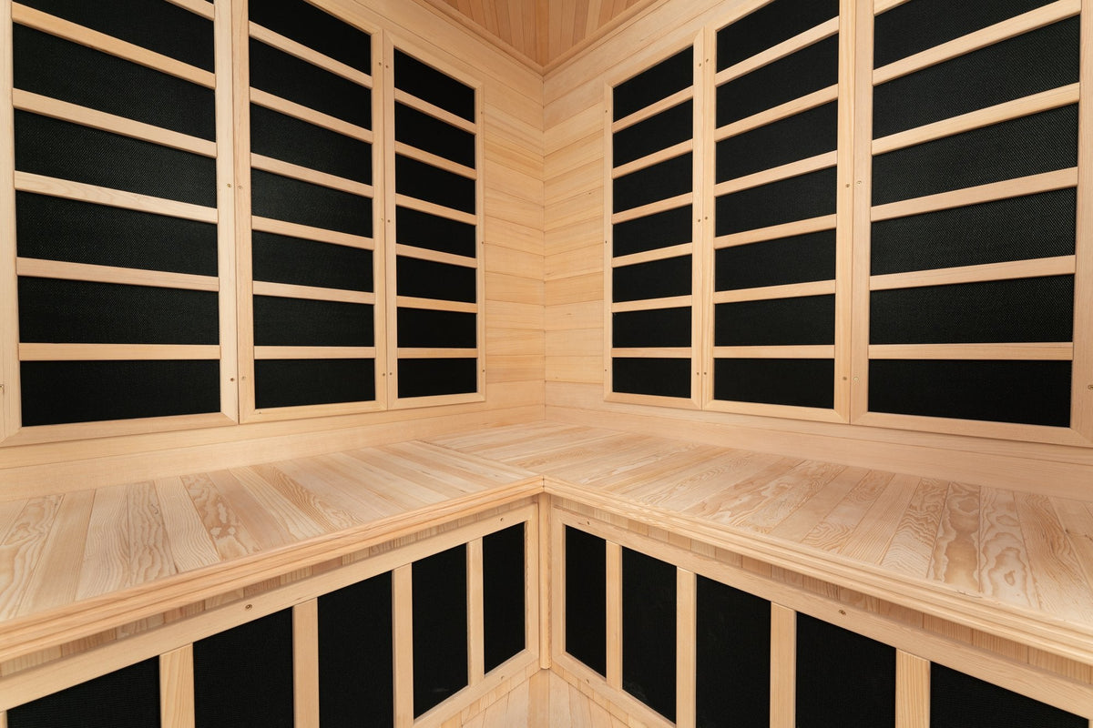 Blisspod Vienna corner sauna, close-up view of interior wooden bench and panels.